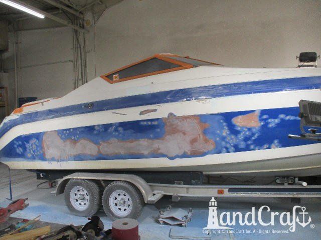 Wellcraft boat in process of exterior fiberglass and gelcoat repair