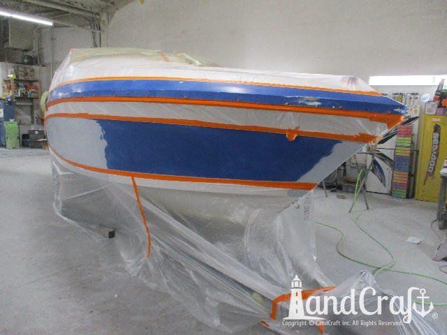 Wellcraft boat in process of exterior refinishing prep work