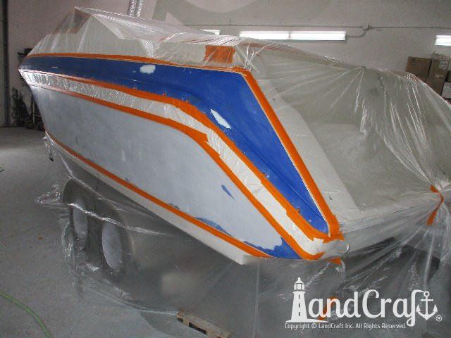 Wellcraft boat in process of exterior refinishing prep work
