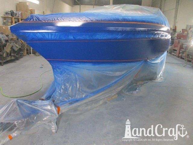 Wellcraft boat in process of exterior refinishing