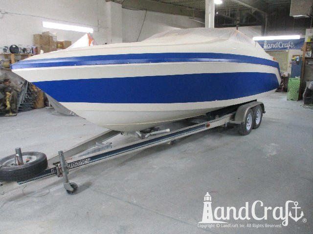 Wellcraft boat with completed exterior repairs and new exterior finish