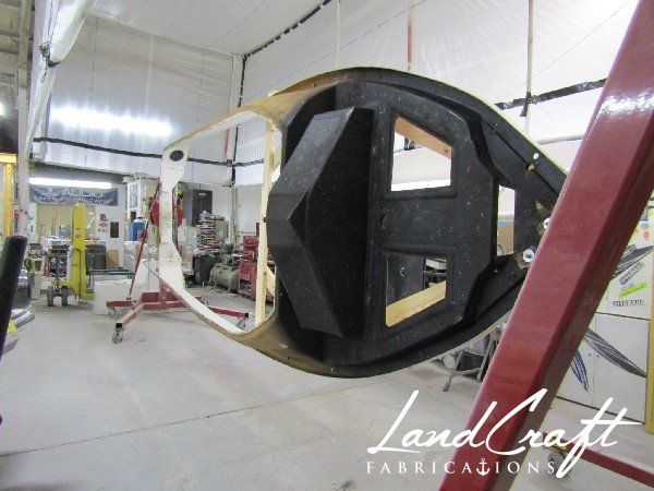 Spirit boat in top cap in process of repair and restoration