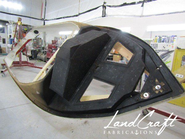 Spirit boat in top cap in process of repair and restoration