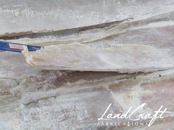 Spirit boat bottom hull interior in process of structural fiberglass repair