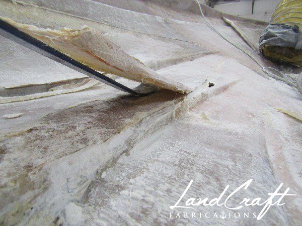 Spirit boat bottom hull interior in process of structural fiberglass repair