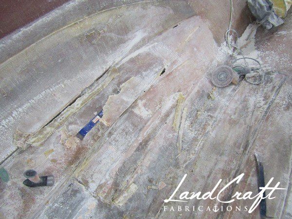 Spirit boat bottom hull interior in process of structural fiberglass repair