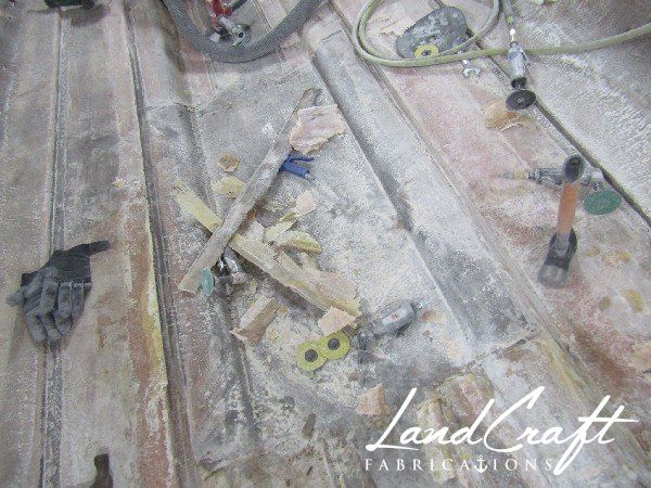 Spirit boat bottom hull interior in process of structural fiberglass repair