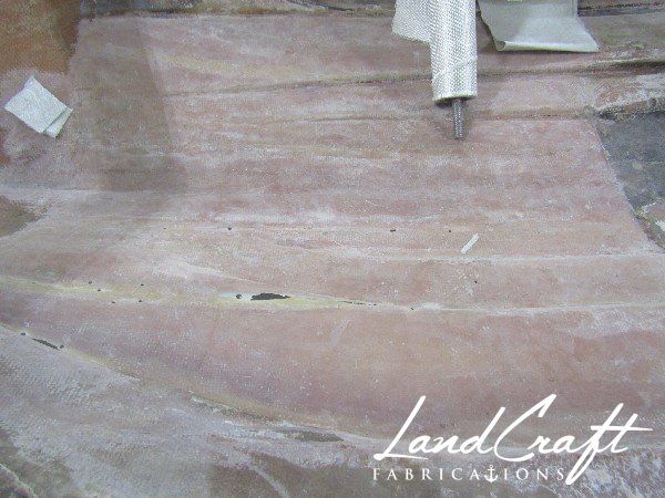 Spirit boat bottom hull interior in process of structural fiberglass repair