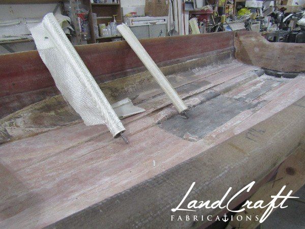 Spirit boat bottom hull interior in process of structural fiberglass repair