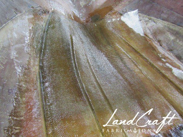 Spirit boat bottom hull interior in process of structural fiberglass repair