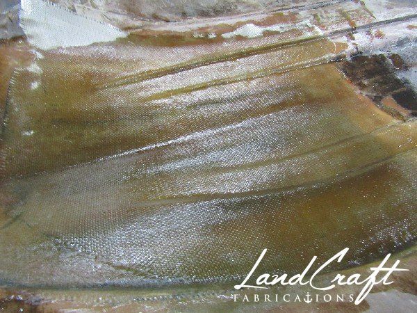 Spirit boat bottom hull interior in process of structural fiberglass repair