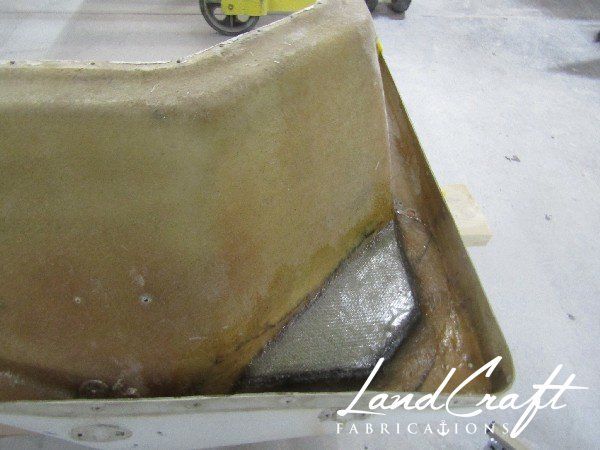 Spirit boat top cap in process of structural fiberglass repair