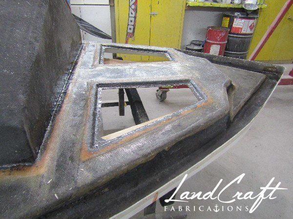 Spirit boat top cap in process of structural fiberglass repair