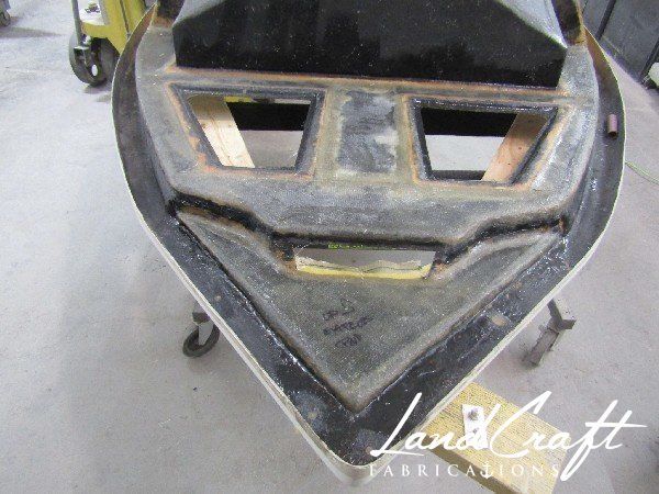 Spirit boat top cap in process of structural fiberglass repair