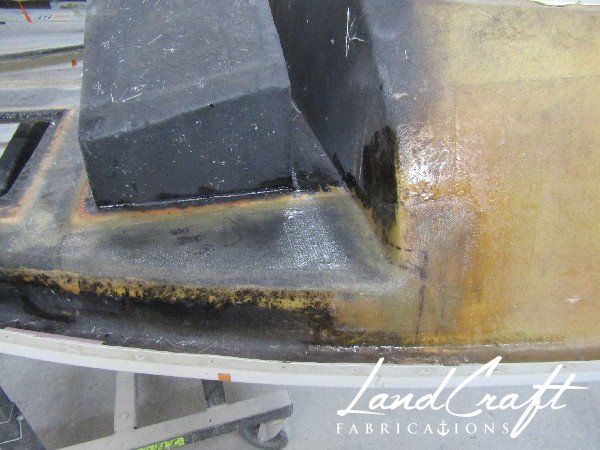 Spirit boat top cap in process of structural fiberglass repair