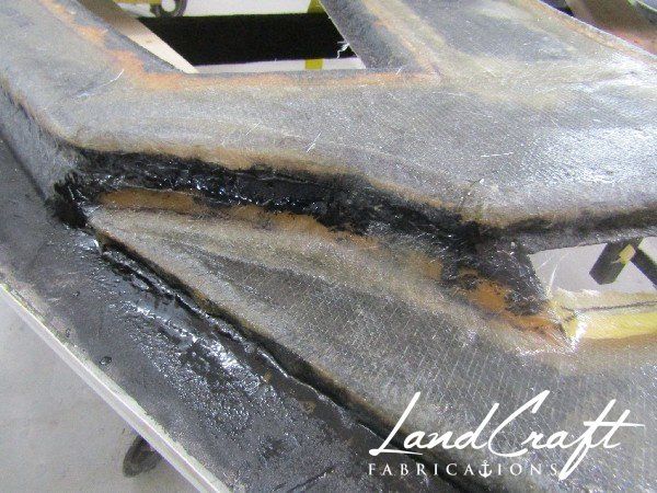 Spirit boat top cap in process of structural fiberglass repair