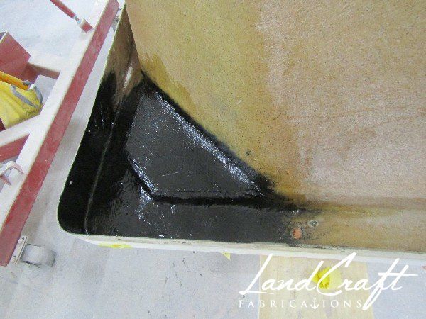 Spirit boat top cap in process of structural fiberglass repair