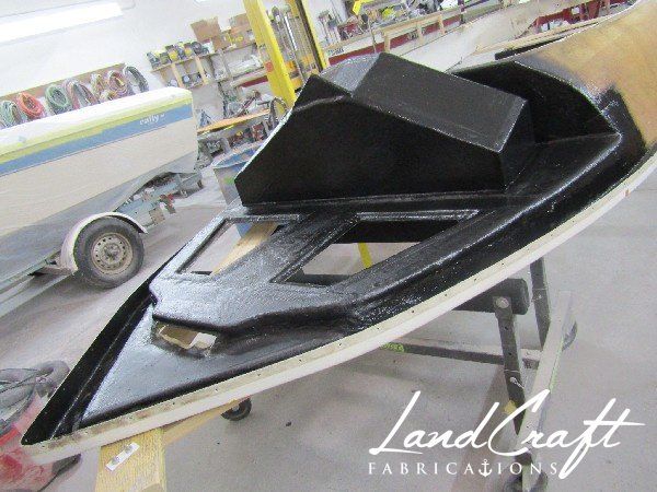 Spirit boat top cap in process of structural fiberglass repair