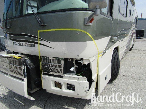 Country Coach motor coach with major front end structural damage