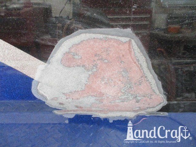 Fiberglass Lund boat with metalflake gelcoat damage