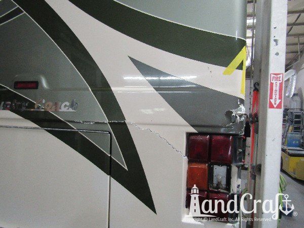 Country Coach motor coach with major rear end structural damage