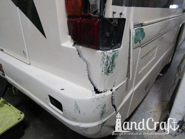 Country Coach motor coach with major rear end structural damage