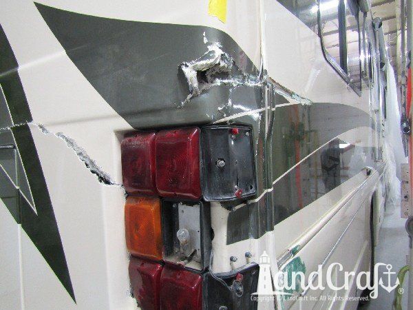 Country Coach motor coach with major rear end structural damage