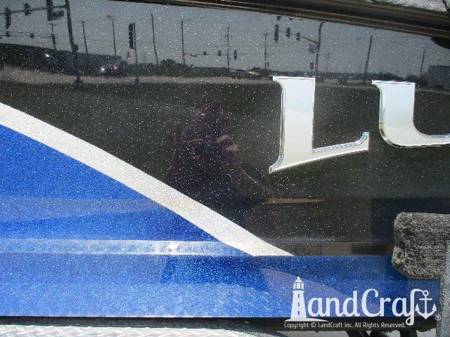 Fiberglass Lund boat with metalflake gelcoat that has been repaired