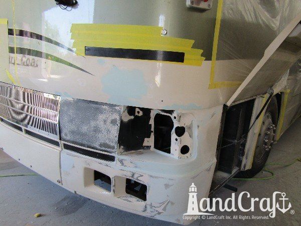 Country Coach motor coach with front end fiberglass damage in the repair process