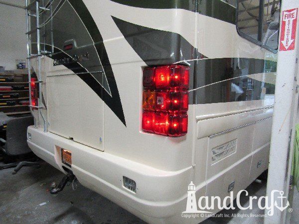 Country Coach motor coach with rear end repaired and refinished