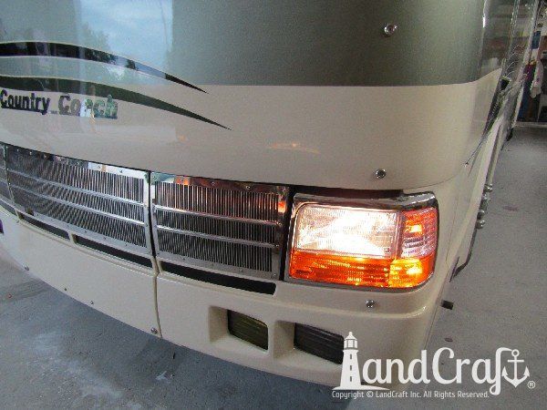 Country Coach motor coach with front end repaired and refinished
