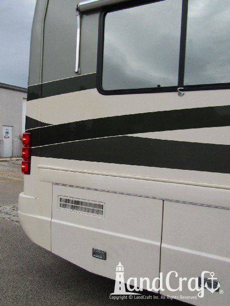 Country Coach motor coach with rear end repaired and refinished