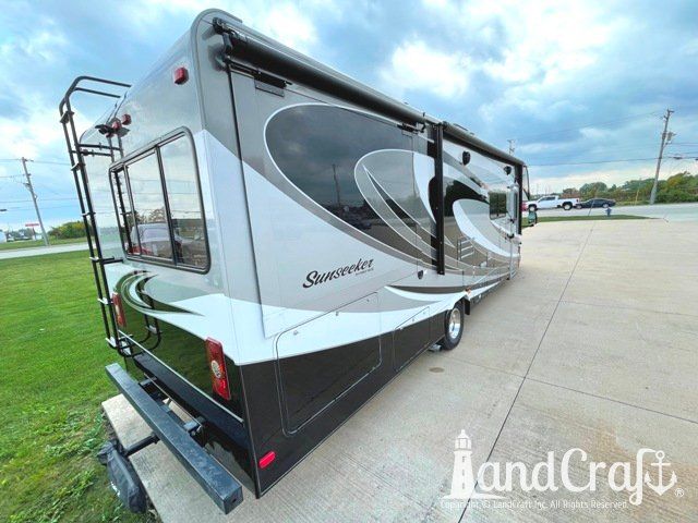 Forest River RV fiberglass repairs and paint refinishing completed