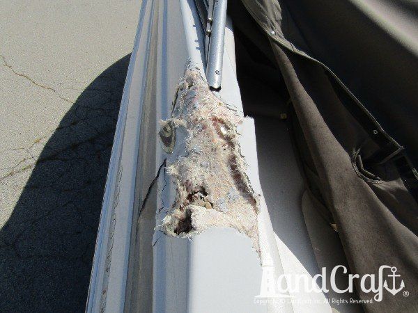 Crownline boat with structural fiberglass collision damage along top gunnel