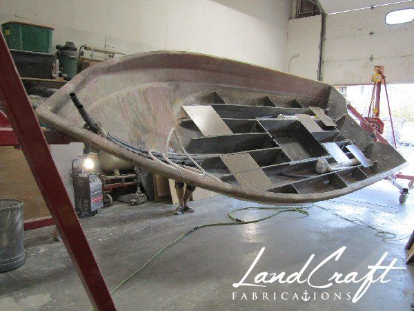 Spirit boat custom fabrication and composite reconstruction in process