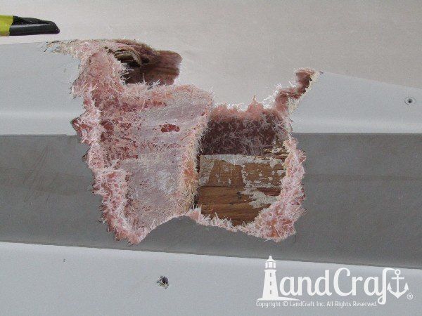 Crownline boat with structural damage exposed in the repair process