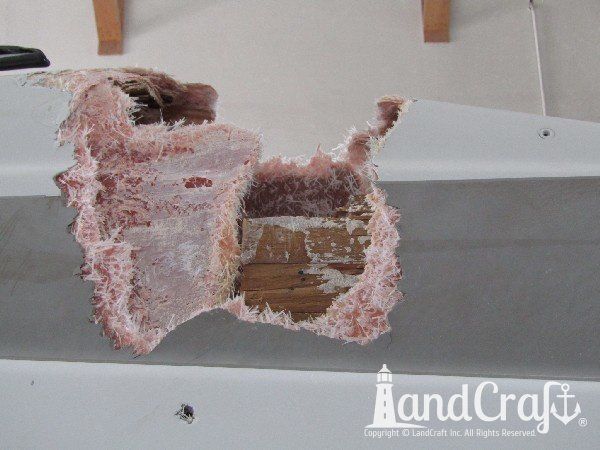 Crownline boat with structural damage exposed in the repair process