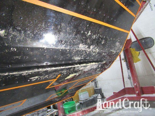 Picture of bottom scratch and dent damage on aluminum boat