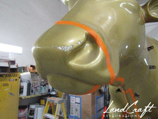 Top Cow statue fiberglass damage