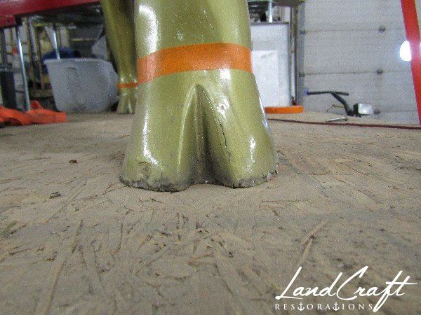 Top Cow statue fiberglass damage