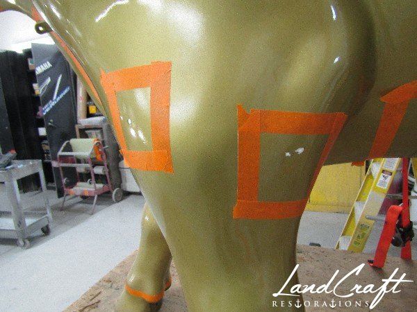 Top Cow statue fiberglass damage