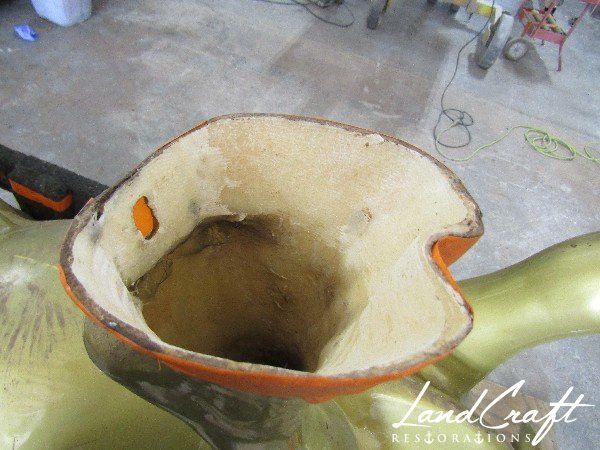 Top Cow art piece statue fiberglass structural repairs in process