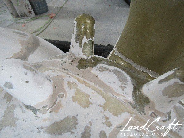 Top Cow art piece statue fiberglass structural repairs in process