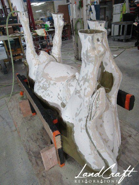 Top Cow art piece statue fiberglass structural repairs in process