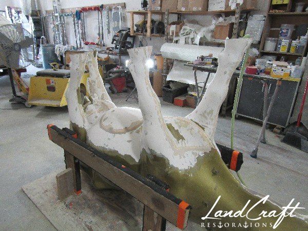 Top Cow art piece statue fiberglass structural repairs in process