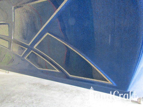 Legend boat that has been repaired in multiple areas of metalflake colors and specialty fades