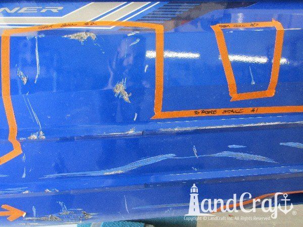 Yamaha waverunner with multiple areas of damage on the bottom hull