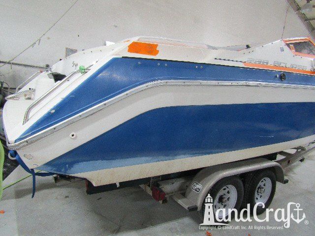 Wellcraft boat before exterior repairs and refinishing