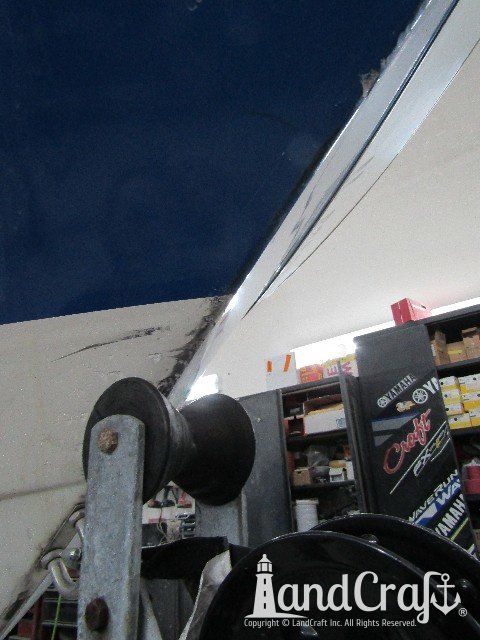 Wellcraft boat before exterior repairs and refinishing