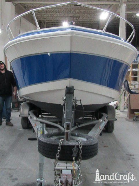 Wellcraft boat with completed exterior repairs and new exterior finish